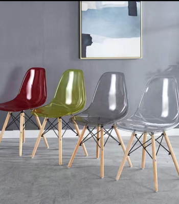 acrylic wooden leg dining chair, clear acrylic dining chair, modern acrylic chair, dining chair with wooden legs, transparent dining chair, acrylic seat wood leg chair, minimalist acrylic dining chair, wooden base acrylic chair, clear dining room chair, plastic acrylic dining chair, designer acrylic chair, Scandinavian acrylic chair, sturdy acrylic wood leg chair, stylish acrylic dining chair, ghost chair with wood legs, lucite dining chair, contemporary acrylic chair, clear chair for dining table, wooden leg clear chair, modern clear acrylic seating, durable acrylic wood chair, elegant acrylic dining chair, see-through dining chair, acrylic kitchen chair with wood legs