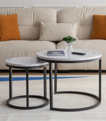 nesting coffee table, modern nesting table set, space-saving coffee tables, round nesting coffee tables, stackable coffee table set, 2-piece nesting tables, small space coffee table, minimalist nesting tables, marble top nesting coffee table, wooden nesting coffee table, glass nesting coffee table, metal frame nesting tables, nesting tables for living room, nesting accent tables, compact coffee table set, contemporary nesting tables, rustic nesting coffee table, Scandinavian nesting coffee table, stylish nesting table set, functional coffee table pair, nesting tables with storage, nested coffee table design, dual coffee table set, coffee table with smaller side table, multi-level coffee tables