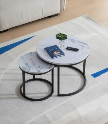 nesting coffee table, modern nesting table set, space-saving coffee tables, round nesting coffee tables, stackable coffee table set, 2-piece nesting tables, small space coffee table, minimalist nesting tables, marble top nesting coffee table, wooden nesting coffee table, glass nesting coffee table, metal frame nesting tables, nesting tables for living room, nesting accent tables, compact coffee table set, contemporary nesting tables, rustic nesting coffee table, Scandinavian nesting coffee table, stylish nesting table set, functional coffee table pair, nesting tables with storage, nested coffee table design, dual coffee table set, coffee table with smaller side table, multi-level coffee tables
