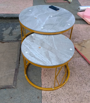 set of nesting tables, nesting coffee tables, modern nesting table set, stackable side tables, small space nesting tables, round nesting tables, wooden nesting table set, space-saving coffee tables, minimalist nesting tables, nested end tables, nesting tables for living room, contemporary nesting tables, compact nesting tables, decorative nesting table set, multi-size table set, 3-piece nesting tables, nesting tables with metal frame, nesting tables for small rooms, glass top nesting tables, elegant nesting coffee tables, nesting tables with storage, stylish stackable tables, square nesting tables, nesting tables with marble top, nesting accent tables, nesting tables for bedroom, rustic nesting table set, nesting tables for lounges, gold frame nesting tables, nesting tables for modern interiors