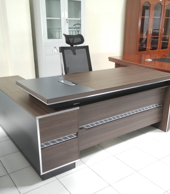 executive office desk, 1600mm executive desk, advanced office desk, modern executive desk, luxury office desk, office table for managers, 1.6m office desk, spacious office desk, professional office desk, ergonomic executive desk, wooden executive desk, sleek office desk, office desk with drawers, sturdy executive desk, corporate office desk, work desk for executives, high-end office furniture, minimalist executive desk, premium office desk, boardroom executive desk, CEO office desk, director’s office table, modern manager’s desk, large office desk, contemporary executive table, workspace desk, wide office desk, 1600mm work table, advanced design desk, durable executive table, formal office desk, stylish executive desk, premium wood desk, dark wood executive desk, L-shaped executive desk, office workstation desk, functional executive desk, solid wood office desk, advanced design office table, modular executive desk, executive office table with storage, modern business desk, executive writing desk, top-rated executive desk, imported executive desk, Kenyan executive desk, spacious tabletop desk, elite office desk, executive table with cable grommets, durable office workstation, elegant wood desk, compact executive desk, black finish executive desk, walnut finish desk, white executive desk, high-capacity executive desk, professional workspace table, office desk for laptop, commercial executive table, business executive desk, scratch-resistant desk, easy-to-assemble office desk, office table for documents, solid desk with storage, metal frame office desk, hardwood executive desk, minimalist work desk, designer executive desk, advanced office furniture, smart office desk, file storage desk, cable management desk, best office desk 2025, trending executive desks, mahogany executive desk, modern workspace table, robust office desk, desk with side cabinet, office desk for CEOs, top-quality executive desk, advanced workstation furniture, luxury workspace furniture, modern professional desk, smart design executive table, top finish executive desk, advanced desk with lockable drawers, high-end ergonomic office desk, executive desk for conference rooms, wide surface desk, rectangular executive table, professional interior furniture, classy executive desk, long-lasting wood office desk, premium executive desk in Nairobi, heavy-duty desk, best wooden desk, scratch-proof tabletop desk, affordable