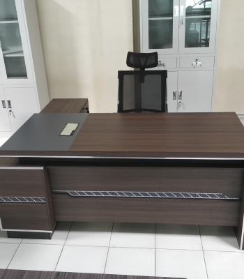 executive office desk, 1600mm executive desk, advanced office desk, modern executive desk, luxury office desk, office table for managers, 1.6m office desk, spacious office desk, professional office desk, ergonomic executive desk, wooden executive desk, sleek office desk, office desk with drawers, sturdy executive desk, corporate office desk, work desk for executives, high-end office furniture, minimalist executive desk, premium office desk, boardroom executive desk, CEO office desk, director’s office table, modern manager’s desk, large office desk, contemporary executive table, workspace desk, wide office desk, 1600mm work table, advanced design desk, durable executive table, formal office desk, stylish executive desk, premium wood desk, dark wood executive desk, L-shaped executive desk, office workstation desk, functional executive desk, solid wood office desk, advanced design office table, modular executive desk, executive office table with storage, modern business desk, executive writing desk, top-rated executive desk, imported executive desk, Kenyan executive desk, spacious tabletop desk, elite office desk, executive table with cable grommets, durable office workstation, elegant wood desk, compact executive desk, black finish executive desk, walnut finish desk, white executive desk, high-capacity executive desk, professional workspace table, office desk for laptop, commercial executive table, business executive desk, scratch-resistant desk, easy-to-assemble office desk, office table for documents, solid desk with storage, metal frame office desk, hardwood executive desk, minimalist work desk, designer executive desk, advanced office furniture, smart office desk, file storage desk, cable management desk, best office desk 2025, trending executive desks, mahogany executive desk, modern workspace table, robust office desk, desk with side cabinet, office desk for CEOs, top-quality executive desk, advanced workstation furniture, luxury workspace furniture, modern professional desk, smart design executive table, top finish executive desk, advanced desk with lockable drawers, high-end ergonomic office desk, executive desk for conference rooms, wide surface desk, rectangular executive table, professional interior furniture, classy executive desk, long-lasting wood office desk, premium executive desk in Nairobi, heavy-duty desk, best wooden desk, scratch-proof tabletop desk, affordable