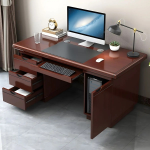 Mahogany CEO Office Desk – Command Presence with Timeless Elegance Make a bold statement in your executive suite with the Mahogany CEO Office Desk, designed to reflect authority, sophistication, and prestige. Crafted with rich mahogany wood finishes and premium construction, this desk is more than just a workstation—it’s a symbol of leadership and refined taste. With an expansive surface, elegant detailing, and integrated storage, it offers unmatched functionality while enhancing the visual grandeur of your office. Whether used in a corporate boardroom or a luxury home office, this desk commands attention and delivers performance. Key Features & Benefits ✅ Rich Mahogany Finish – Classic wood tones that exude elegance and professionalism ✅ Spacious Work Surface – Ideal for documents, computers, décor, and meetings ✅ Integrated Storage Options – Includes drawers, cabinets, or side returns for organization ✅ High-End Craftsmanship – Built with solid wood, veneer, or high-grade MDF for durability ✅ Cable Management Ports – Keep cords hidden for a clean, executive look ✅ Ornate Design Accents – Includes beveled edges, panel details, or chrome/metal trims ✅ Scratch & Stain Resistant – Finished for long-term use and easy maintenance ✅ Optional L-Shape or U-Shape Configuration – Customize based on office layout Ideal For: CEOs, directors, and senior executives Luxury home offices Boardrooms and professional suites Law firms, financial institutions, and consultancies