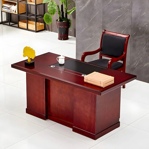 Mahogany CEO Office Desk – Command Presence with Timeless Elegance Make a bold statement in your executive suite with the Mahogany CEO Office Desk, designed to reflect authority, sophistication, and prestige. Crafted with rich mahogany wood finishes and premium construction, this desk is more than just a workstation—it’s a symbol of leadership and refined taste. With an expansive surface, elegant detailing, and integrated storage, it offers unmatched functionality while enhancing the visual grandeur of your office. Whether used in a corporate boardroom or a luxury home office, this desk commands attention and delivers performance. Key Features & Benefits ✅ Rich Mahogany Finish – Classic wood tones that exude elegance and professionalism ✅ Spacious Work Surface – Ideal for documents, computers, décor, and meetings ✅ Integrated Storage Options – Includes drawers, cabinets, or side returns for organization ✅ High-End Craftsmanship – Built with solid wood, veneer, or high-grade MDF for durability ✅ Cable Management Ports – Keep cords hidden for a clean, executive look ✅ Ornate Design Accents – Includes beveled edges, panel details, or chrome/metal trims ✅ Scratch & Stain Resistant – Finished for long-term use and easy maintenance ✅ Optional L-Shape or U-Shape Configuration – Customize based on office layout Ideal For: CEOs, directors, and senior executives Luxury home offices Boardrooms and professional suites Law firms, financial institutions, and consultancies