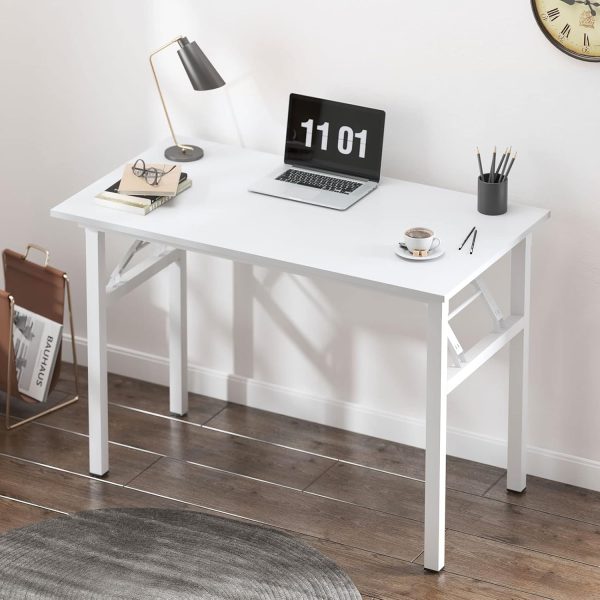 Short Description – Home Small Folding Table The Home Small Folding Table offers a practical and versatile solution for compact spaces. Its foldable design makes it easy to store when not in use, while the sturdy build ensures reliable performance for everyday tasks. Perfect for dining, studying, or extra workspace, this table adapts effortlessly to your needs. Key Features: Space-saving foldable design for easy storage Lightweight and portable for flexible use around the home Durable construction for long-lasting performance Smooth tabletop surface ideal for dining, working, or crafts Quick setup and folding with minimal effort