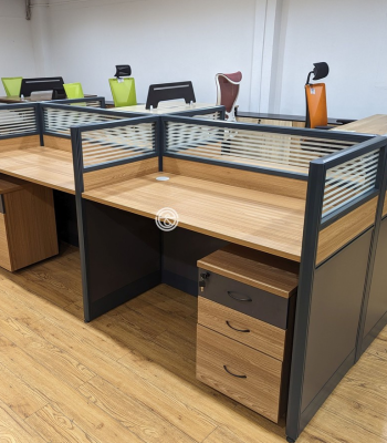 Focus Keyphrase: Curved Office Workstation Desk Upgrade your workspace with our Curved Office Workstation Desk, designed for enhanced productivity, ergonomic comfort, and modern aesthetics. The sleek curved design offers a professional look while maximizing usable surface area, making it perfect for corporate offices, co-working spaces, and home setups. Crafted from durable materials, this workstation supports heavy daily use while maintaining an elegant, clutter-free appearance. Cable management features and ample legroom ensure a clean and comfortable working environment. Key Features: Ergonomic curved design for comfort and improved workflow Spacious desktop surface suitable for dual monitors and office accessories Modern professional style to elevate office aesthetics Sturdy construction with high-quality materials for durability Integrated cable management for a tidy setup Ideal for open-plan offices, executives, or home offices