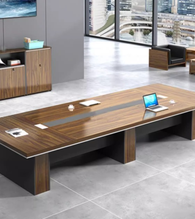 Modern Conference Office Table – Create a professional and collaborative environment with this sleek modern conference table. Designed for meetings, brainstorming sessions, and team discussions, it offers a spacious surface and contemporary style that enhances any office setting. Built with durable materials, this table provides long-lasting performance while making your meeting room look elegant and inviting. Key Features: Spacious Design: Large tabletop accommodates multiple participants comfortably. Modern Aesthetic: Sleek finish that complements executive and corporate interiors. Durable Construction: Crafted from high-quality engineered wood/metal for stability. Functional Layout: Ideal for meetings, presentations, and group discussions. Versatile Sizes: Available in different dimensions to suit various office spaces. Professional Appeal: Enhances the look and feel of boardrooms and conference halls.