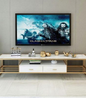 Modern Marble TV Console – Luxury Meets Functionality Enhance your living room with the Modern Marble TV Console, designed to combine elegance, durability, and modern functionality. Its marble finish adds a luxurious statement to any interior. Moreover, the sleek design creates a stylish focal point while keeping your entertainment area organized and clutter-free. Premium Marble Finish and Strong Build This TV console features a high-quality marble or marble-effect tabletop paired with a sturdy metal or engineered wood base. As a result, it offers excellent durability and long-term performance. Additionally, the scratch-resistant and heat-resistant surface ensures the console maintains its refined appearance even with daily use. Spacious and Practical Storage The Modern Marble TV Console provides ample storage for your entertainment essentials. It includes spacious cabinets, drawers, or open shelves for media devices, remote controls, books, and décor items. Furthermore, the wide tabletop comfortably supports flat-screen TVs while leaving room for decorative accents. Stylish and Contemporary Design With its clean lines and elegant marble finish, this TV console complements modern, contemporary, and luxury interiors. Moreover, the neutral tones blend seamlessly with different color schemes and furniture styles. This makes it suitable for living rooms, lounges, apartments, or executive spaces. Cable Management and Convenience Designed with practicality in mind, the console includes built-in cable management openings. These allow you to organize wires neatly and maintain a clean, polished look. In addition, the elevated base makes cleaning underneath easy, improving overall convenience. Easy Assembly and Low Maintenance Assembly is quick and straightforward, with clear instructions and fittings included. In addition, maintenance is effortless. Simply wipe the marble surface with a soft, damp cloth to remove dust or spills. This low-maintenance design saves time while preserving elegance. Why Choose Our Modern Marble TV Console? Luxurious marble finish for a premium look Durable construction for long-term use Spacious storage for media and accessories Built-in cable management for a tidy setup Modern, elegant design for stylish interiors Finally, the Modern Marble TV Console combines luxury, practicality, and durability, making it the perfect entertainment unit for modern homes that value both style and function.