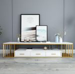 Modern Marble TV Console – Luxury Meets Functionality Enhance your living room with the Modern Marble TV Console, designed to combine elegance, durability, and modern functionality. Its marble finish adds a luxurious statement to any interior. Moreover, the sleek design creates a stylish focal point while keeping your entertainment area organized and clutter-free. Premium Marble Finish and Strong Build This TV console features a high-quality marble or marble-effect tabletop paired with a sturdy metal or engineered wood base. As a result, it offers excellent durability and long-term performance. Additionally, the scratch-resistant and heat-resistant surface ensures the console maintains its refined appearance even with daily use. Spacious and Practical Storage The Modern Marble TV Console provides ample storage for your entertainment essentials. It includes spacious cabinets, drawers, or open shelves for media devices, remote controls, books, and décor items. Furthermore, the wide tabletop comfortably supports flat-screen TVs while leaving room for decorative accents. Stylish and Contemporary Design With its clean lines and elegant marble finish, this TV console complements modern, contemporary, and luxury interiors. Moreover, the neutral tones blend seamlessly with different color schemes and furniture styles. This makes it suitable for living rooms, lounges, apartments, or executive spaces. Cable Management and Convenience Designed with practicality in mind, the console includes built-in cable management openings. These allow you to organize wires neatly and maintain a clean, polished look. In addition, the elevated base makes cleaning underneath easy, improving overall convenience. Easy Assembly and Low Maintenance Assembly is quick and straightforward, with clear instructions and fittings included. In addition, maintenance is effortless. Simply wipe the marble surface with a soft, damp cloth to remove dust or spills. This low-maintenance design saves time while preserving elegance. Why Choose Our Modern Marble TV Console? Luxurious marble finish for a premium look Durable construction for long-term use Spacious storage for media and accessories Built-in cable management for a tidy setup Modern, elegant design for stylish interiors Finally, the Modern Marble TV Console combines luxury, practicality, and durability, making it the perfect entertainment unit for modern homes that value both style and function.