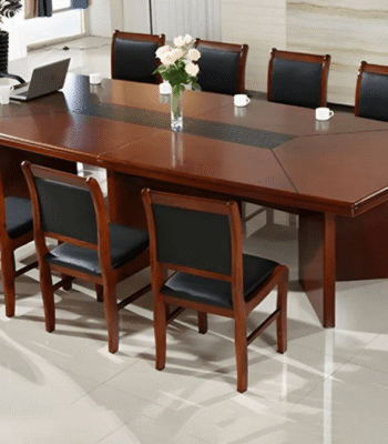 Gookenya office Boardroom Table Prices In kenya Elevate your meeting space with the Mahogany Office Boardroom Table, a sophisticated centerpiece designed for professionalism, durability, and timeless elegance. Perfect for boardrooms, conference rooms, and executive meeting areas, this table combines functionality with a luxurious mahogany finish that adds a touch of prestige to any office environment. Crafted from high-quality solid wood, this table is built to withstand daily use while maintaining its sleek, polished appearance. Its spacious surface accommodates multiple participants comfortably, making it ideal for collaborative meetings, presentations, and strategic discussions. The rich mahogany finish complements modern and classic office interiors, providing a professional yet stylish focal point in your workspace. Designed with both aesthetics and practicality in mind, the table features sturdy legs and reinforced construction, ensuring long-lasting stability and support. The smooth surface is easy to clean and maintain, offering a low-maintenance solution for busy offices. Its generous size allows for laptops, documents, and conference essentials without feeling cluttered, enhancing productivity and efficiency during meetings. Key Features: Material: Premium solid wood with a luxurious mahogany finish. Spacious Surface: Accommodates multiple participants comfortably for meetings. Durable Construction: Sturdy legs and reinforced frame for long-lasting stability. Elegant Design: Classic mahogany finish adds sophistication to any office space. Low Maintenance: Smooth surface is easy to clean and maintain. Professional & Stylish: Ideal for boardrooms, conference rooms, and executive offices. Versatile Use: Suitable for meetings, presentations, and collaborative discussions. Invest in the Mahogany Office Boardroom Table to create a professional and impressive meeting environment. Its combination of elegance, functionality, and durability ensures your boardroom or conference space makes a lasting impression while supporting productive and comfortable discussions.